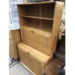 An Ercole light wood bureau bookcase. 163 x 91cm.