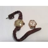 Two 18ct gold wrist watches.