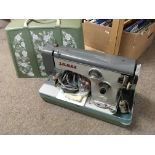 A Vintage electric sewing machine. Jones Model 110