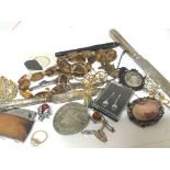 A collection of oddments brooches a 1964 American