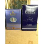 A collection of 8 boxed bells decanters including