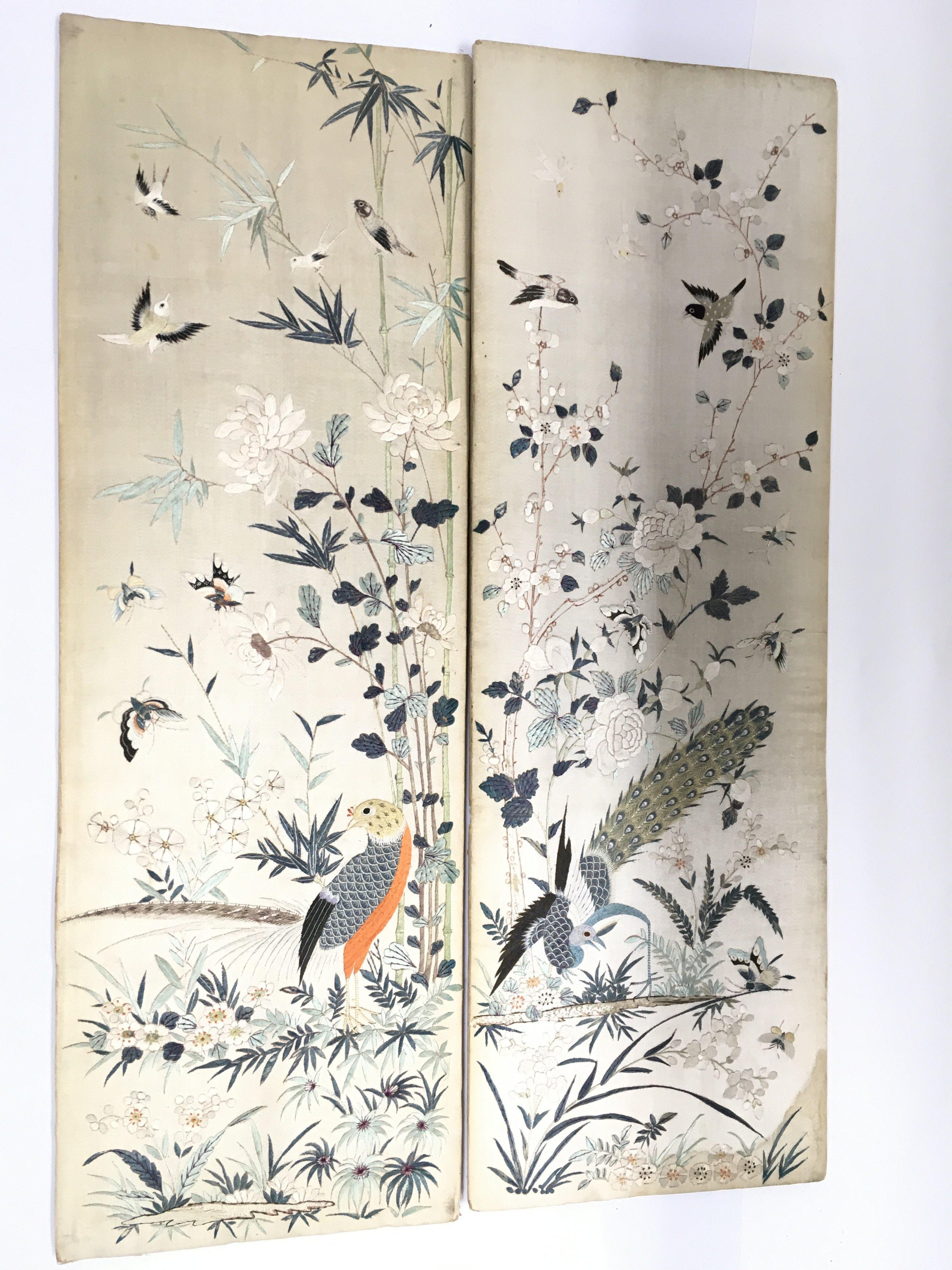 A pair of Chinese silk panels decorated with birds