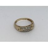A 9ct gold ring set with small diamonds. Size n ap