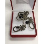 A collection of matching silver jewellery set with