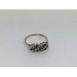 A 9ct gold ring set with 11 sapphires and 11 diamo