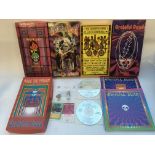 A Grateful Dead collection of CD box sets, 'A Trip Without A Ticket' books and two tour laminates.