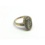 A 9ct gold aquamarine and diamond ring, approx 3.2