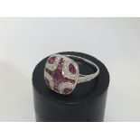 A platinum ruby and diamond Victorian style ring w