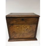 A Victorian walnut stationary box with a hinged front and lid.