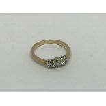 A 9ct gold ring set with 3 diamonds approx 0.5ct.