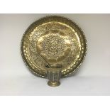 An Islamic brass tray diameter 52 cm and a conform