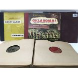 4 record folders inc Oklahoma, Harry James, Freddy Martin etc.