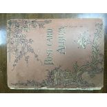 A Vintage postcard album with a collection of gree