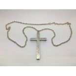 A heavy hallmarked silver cross on chain.