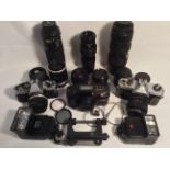 A collection of good mixed cameras and lenses.
