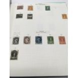 An album of Victorian and later stamps, comprising