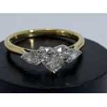 An 18ct yellow gold heart shade diamond ring with