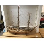 A model of an 18th century war ship fully rigged and with decks of cannons 90cmx 75cm high