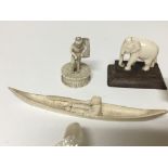 A collection of small carved ivory and bone figure