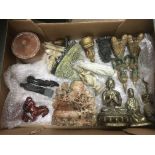 A box containing oriental items including Buddha a