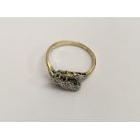 An 18ct gold and 3 stone diamond ring (I).