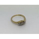 An 18ct gold ring set with 3 diamonds approx 0.5ct