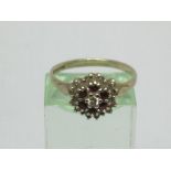 A 9ct gold ring set with rubies, approx 2.3g and a