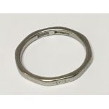 An octagon shaped Platinum wedding band.weight 4g