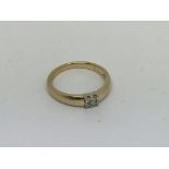 A 14ct gold ring set with 4 diamonds approx 0.10ct