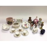 A box of small ceramic items comprising a miniatur
