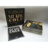 A Nat King Cole 20 record box set. Condition NM.