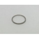 A fine 9ct gold half eternity ring set with diamon