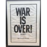 A framed John Lennon And Yoko Ono 'War Is Over' Promotional Poster. Printed in 1971 these posters