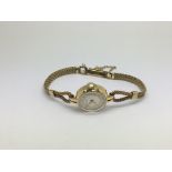 A 9ct gold ladies watch, approx 16.4g.