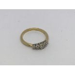 An 18ct gold ring set with 5 diamonds approx 0.15c