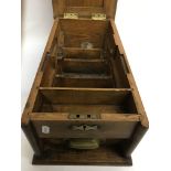An old wooden cash till with pull-out drawer and i