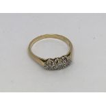 An 18ct gold ring set with 3 diamonds approx 0.5ct