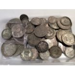 A box containing British coins.