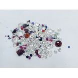 A bag of loose mixed gems inc, Ruby, Garnet, Sapph