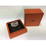 A boxed Hermes silver ring, Approx 24g. (M).