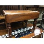 A Victorian mahogany rectangular shaped bidet on t