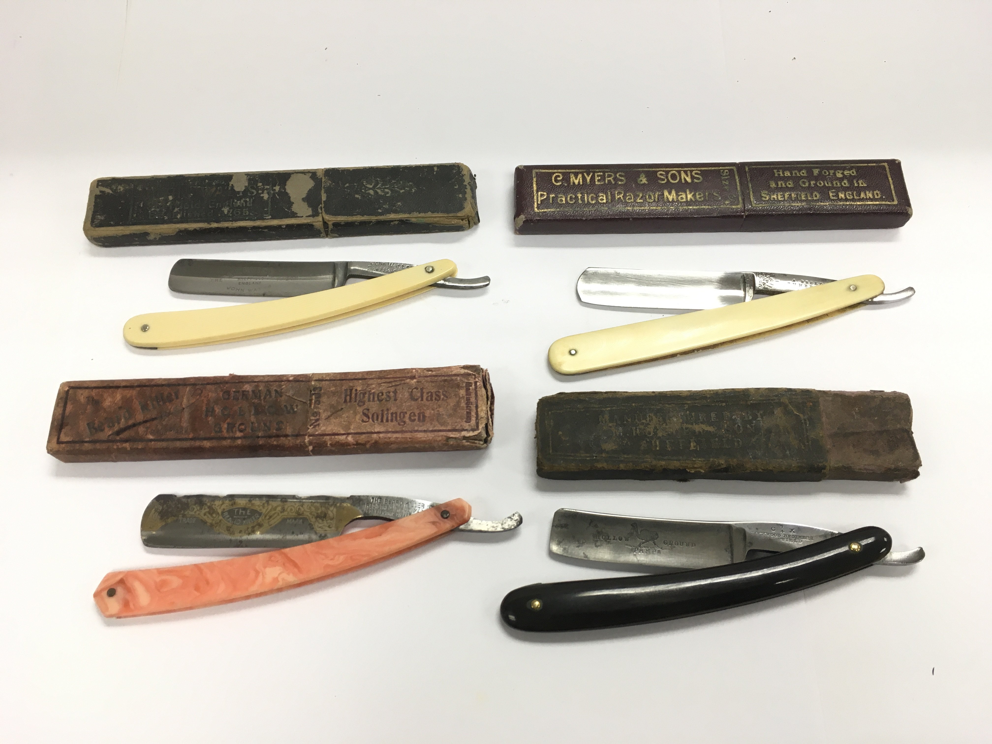 Four straight razors including a rare German examp