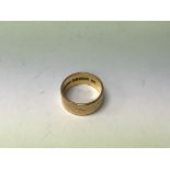 A 22 ct gold band 7 grams