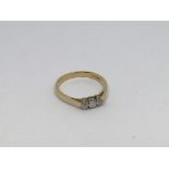 An 18ct gold ring set with 3 diamonds approx 0.25c