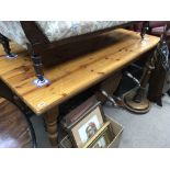 A large pine refectory table 83 x 168cm