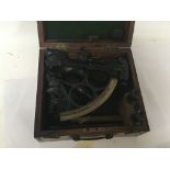 A late 19th century cased brass and metal sextant