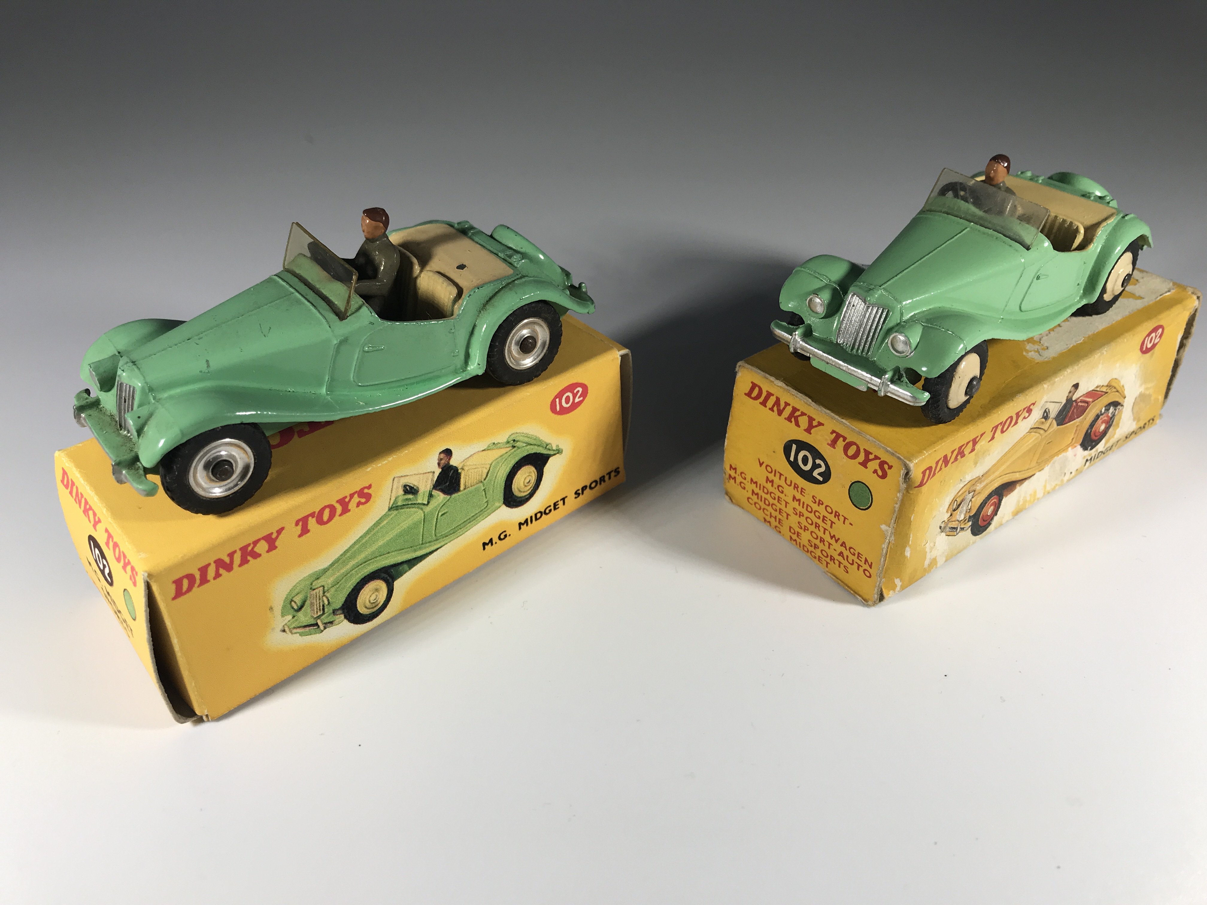 Two Dinky Toys MG Midget Sports #102 (one original