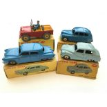 A Dinky Land-Rover #340, a Standard Vanguard Saloon #153, a Studebaker land cruiser #172 and a Austi