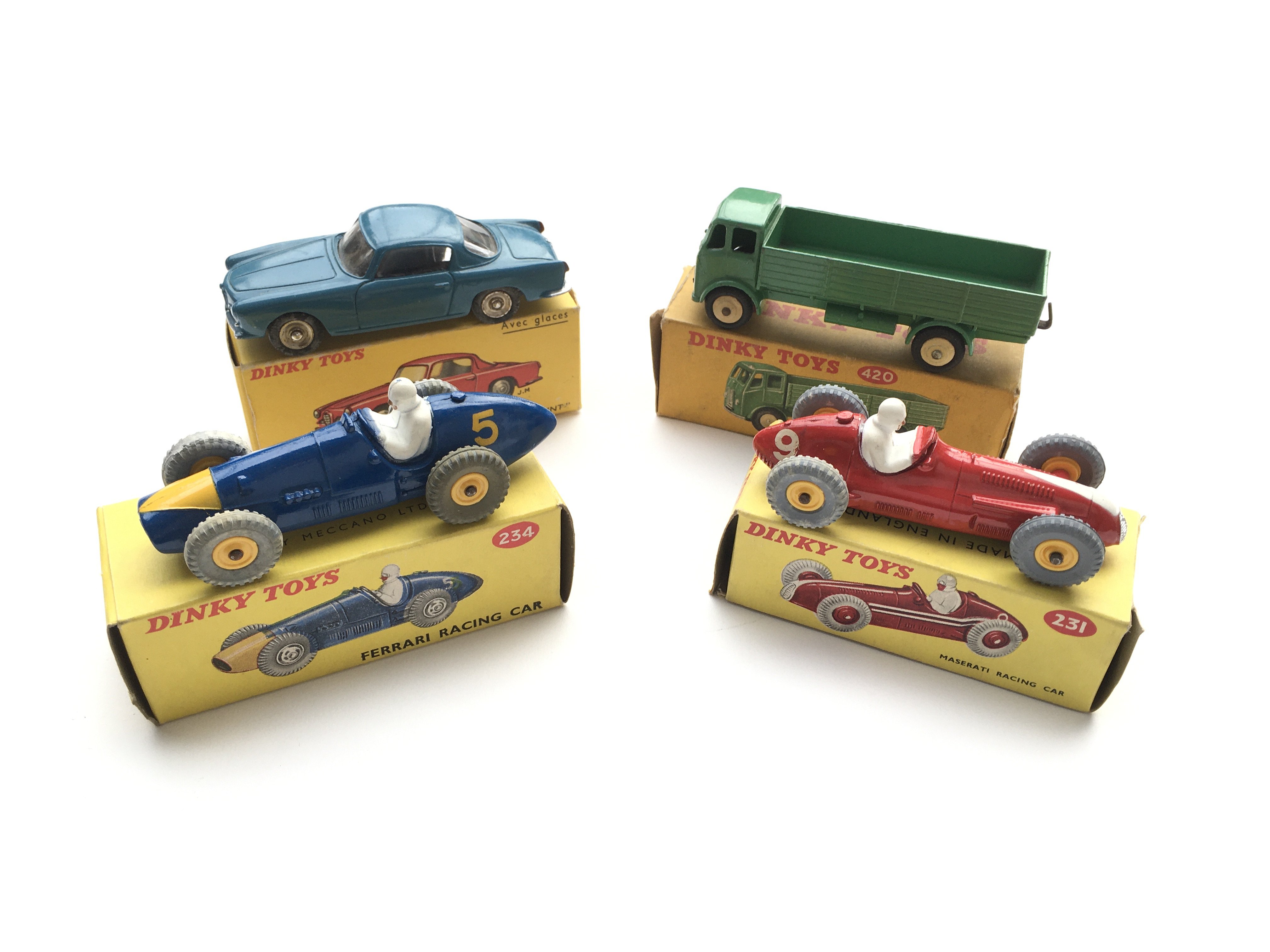 4 boxed Dinky vehicles.#234 Ferrari Racing car, #5