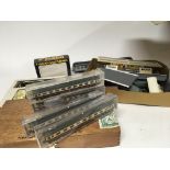 A collection of trains including boxed ROCO 2261B N gauge carriages OO gauge goods wagons two